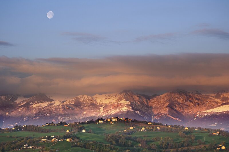 Moon over mountain village