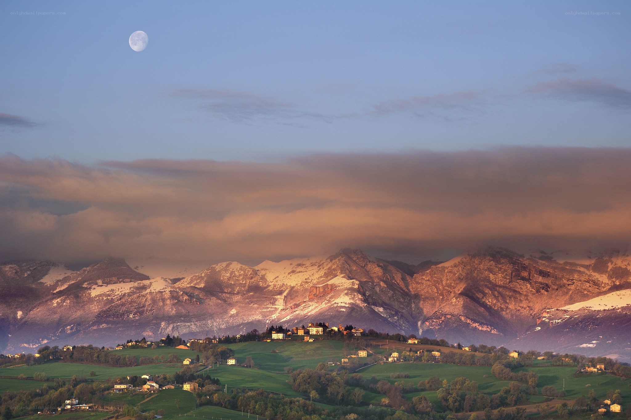 Moon over mountain village