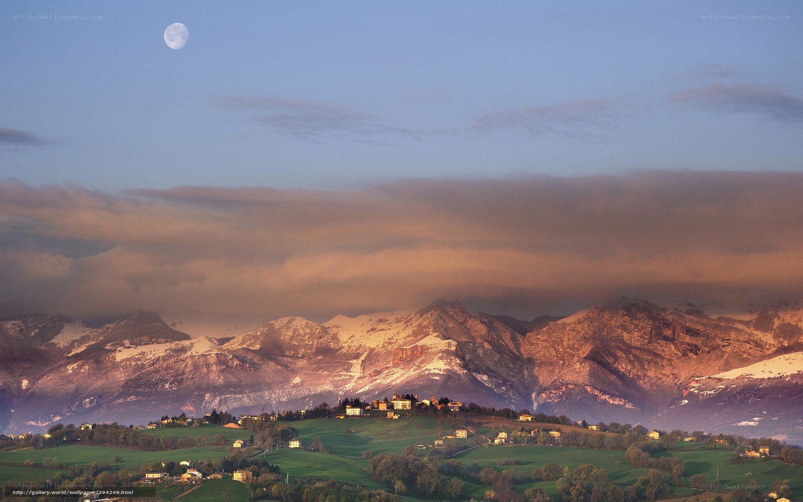 Moon over mountain village
