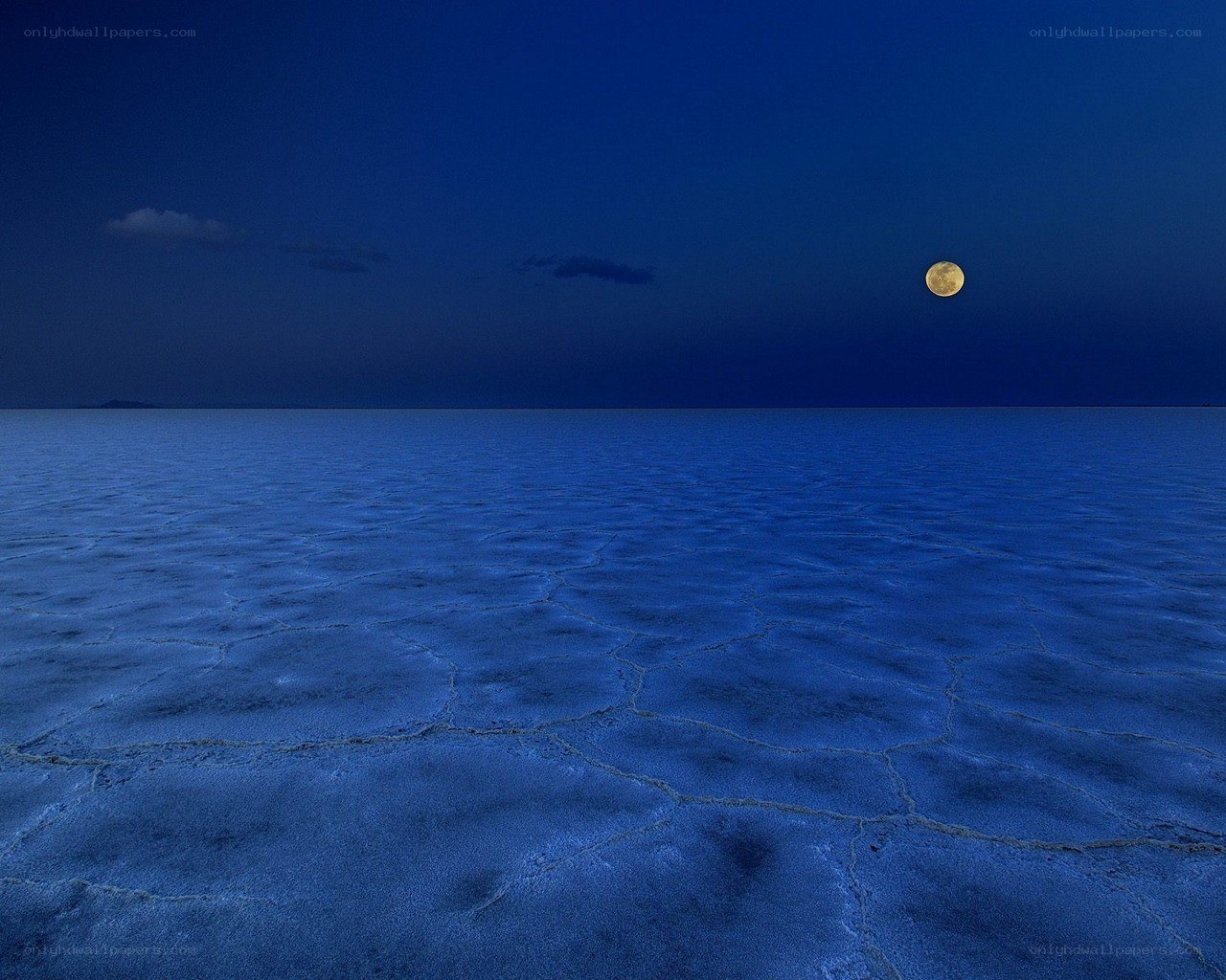 Moon over salt flats