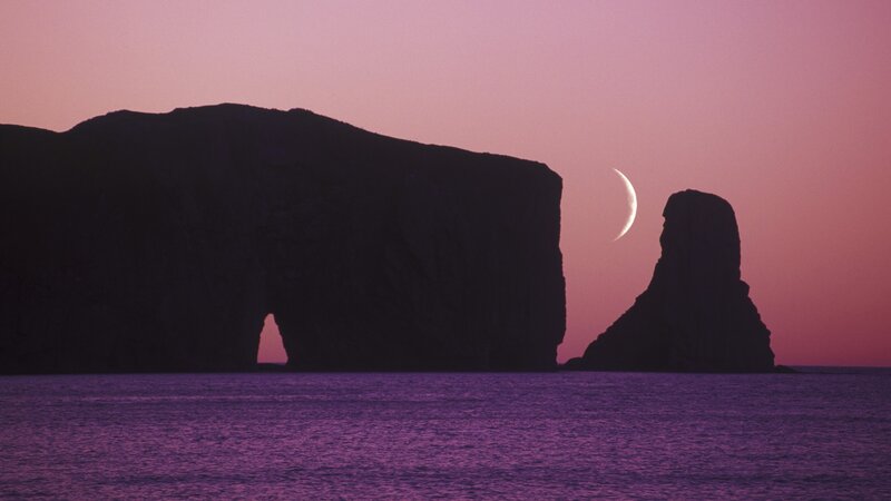 Moon over sea cliffs
