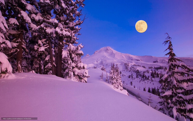 Moon over snowy mountain