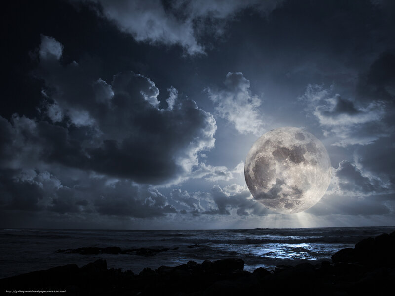 Moon over stormy sea