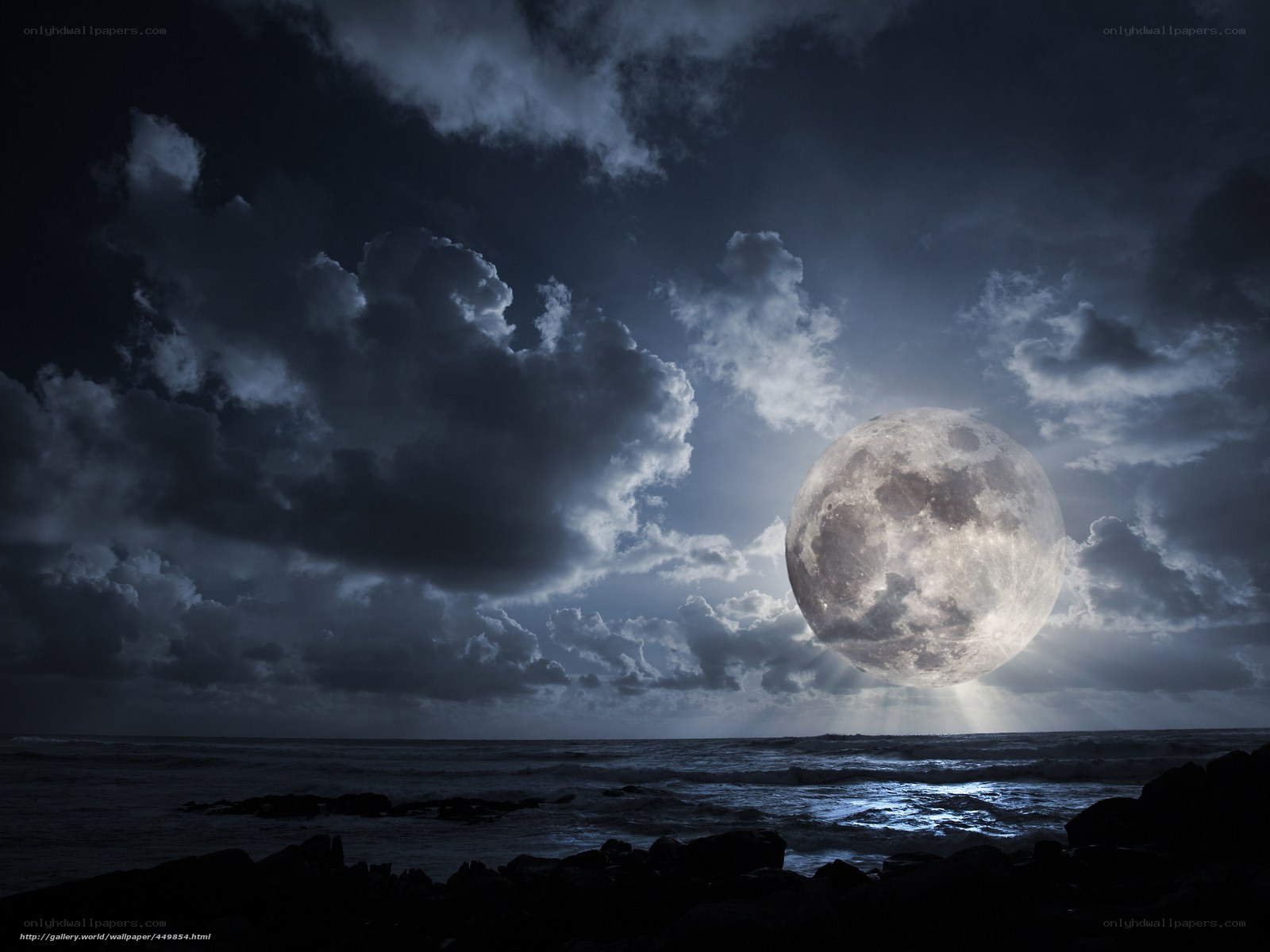 Moon over stormy sea