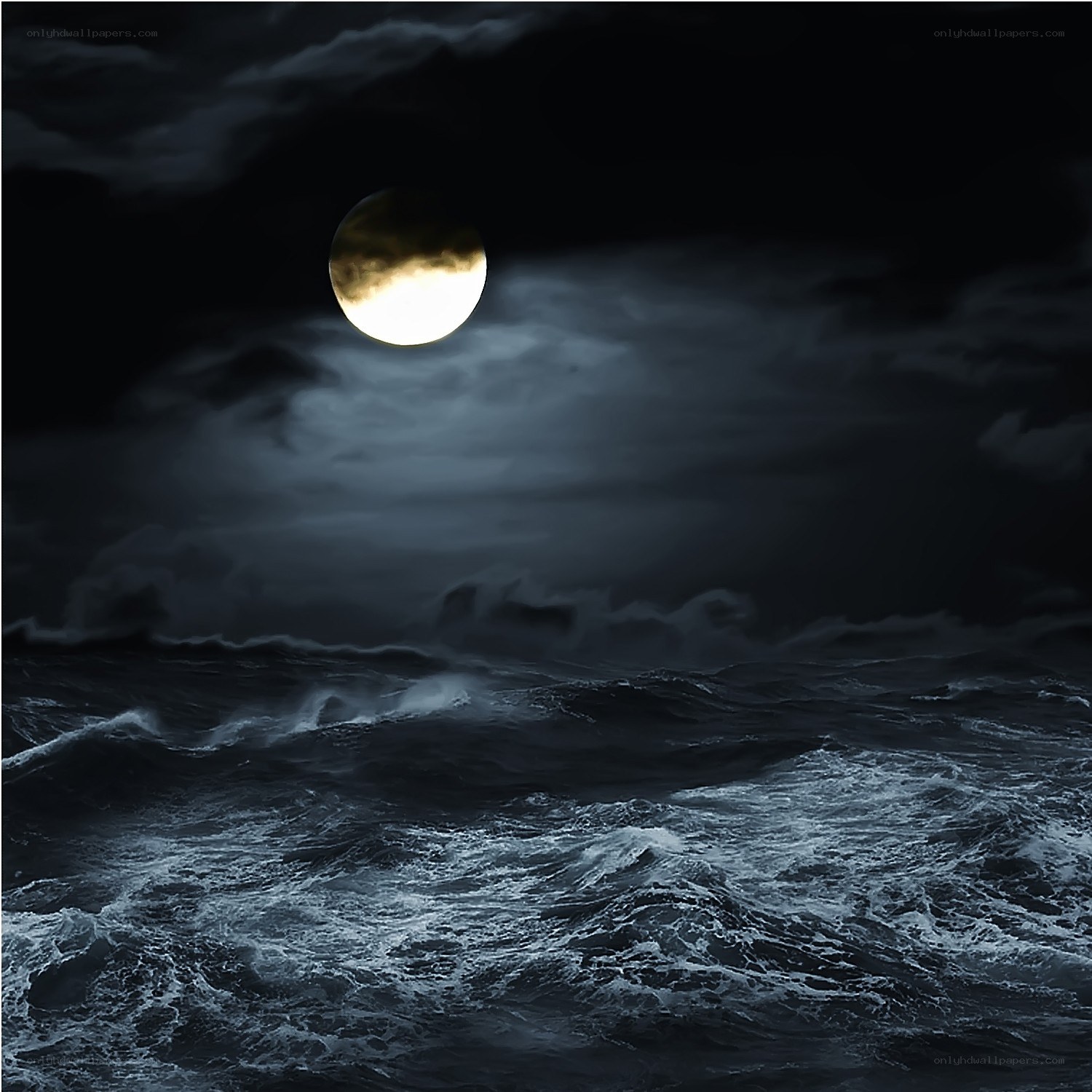 Moon over stormy sea