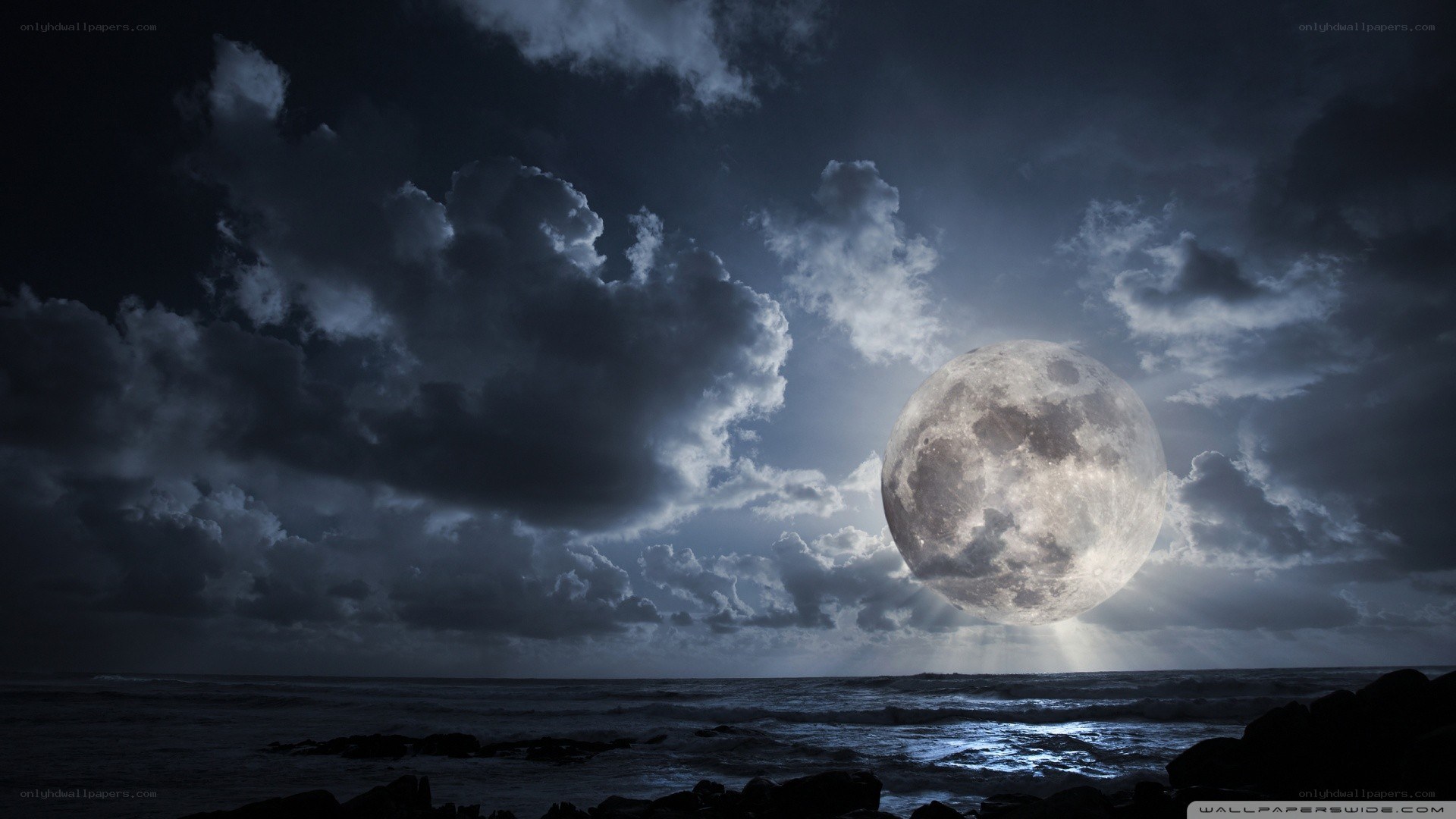 Moon over stormy sea