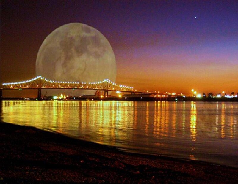 Moon over the bridge at night