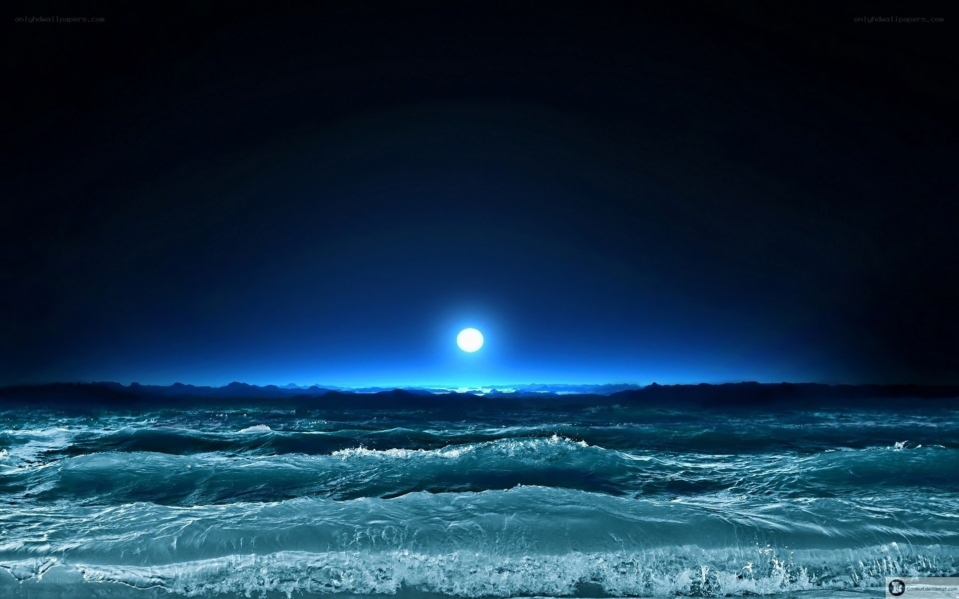 Moon over the ocean at night