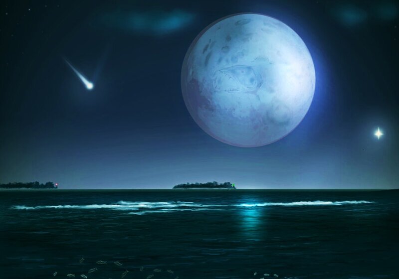 Moon over the ocean at night