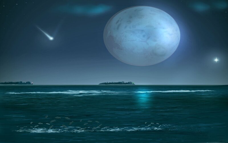 Moon over the ocean at night