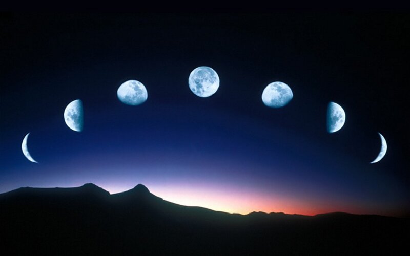 Moon phases over mountains
