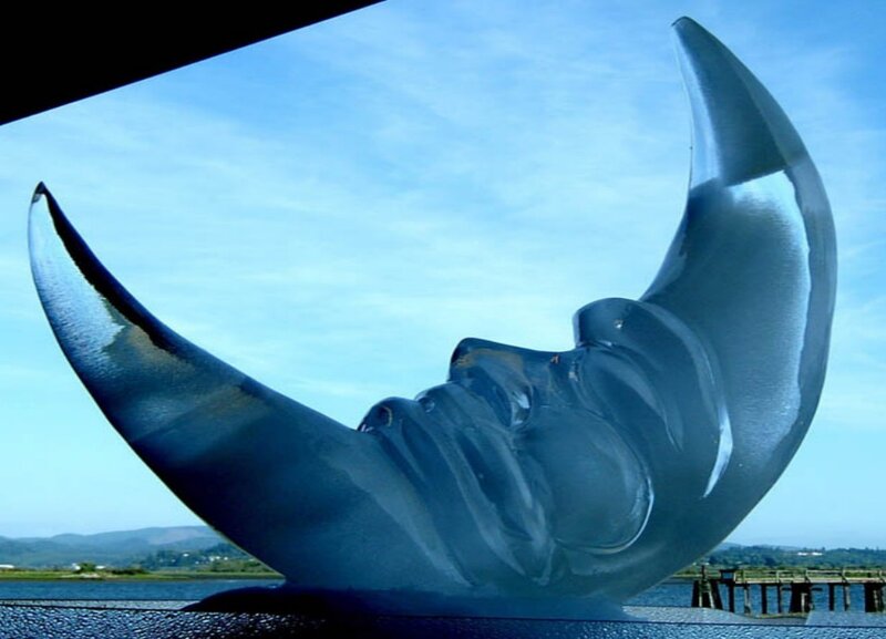 Moon sculpture by water