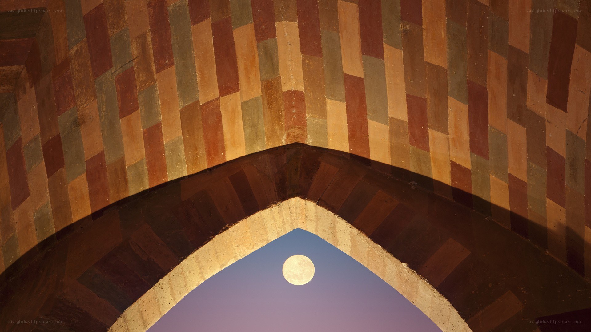 Moon through an arched window