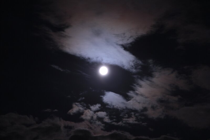 Moon through clouds at night