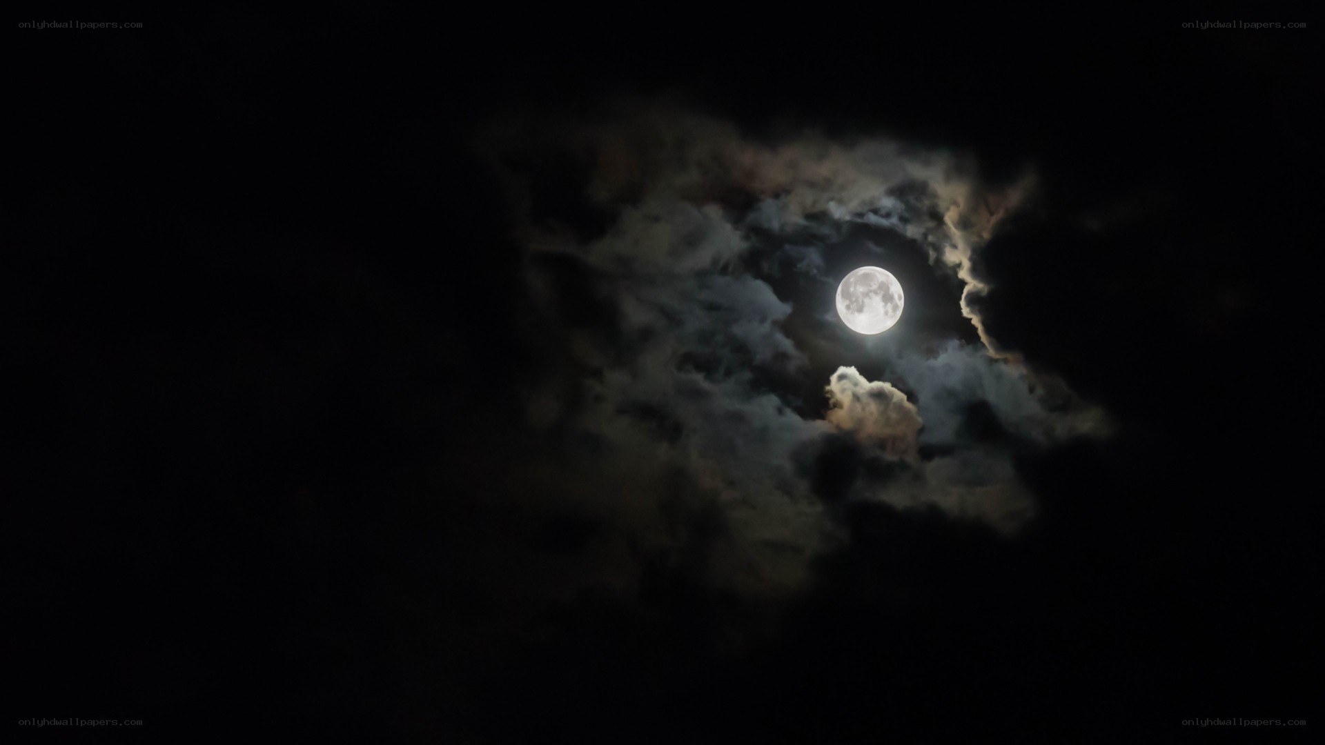 Moon through clouds at night