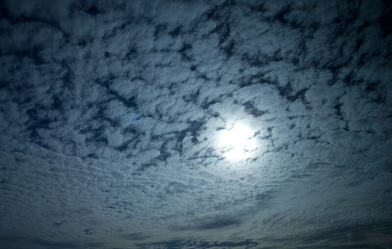 Moon Through Clouds — Gray, Dramatic