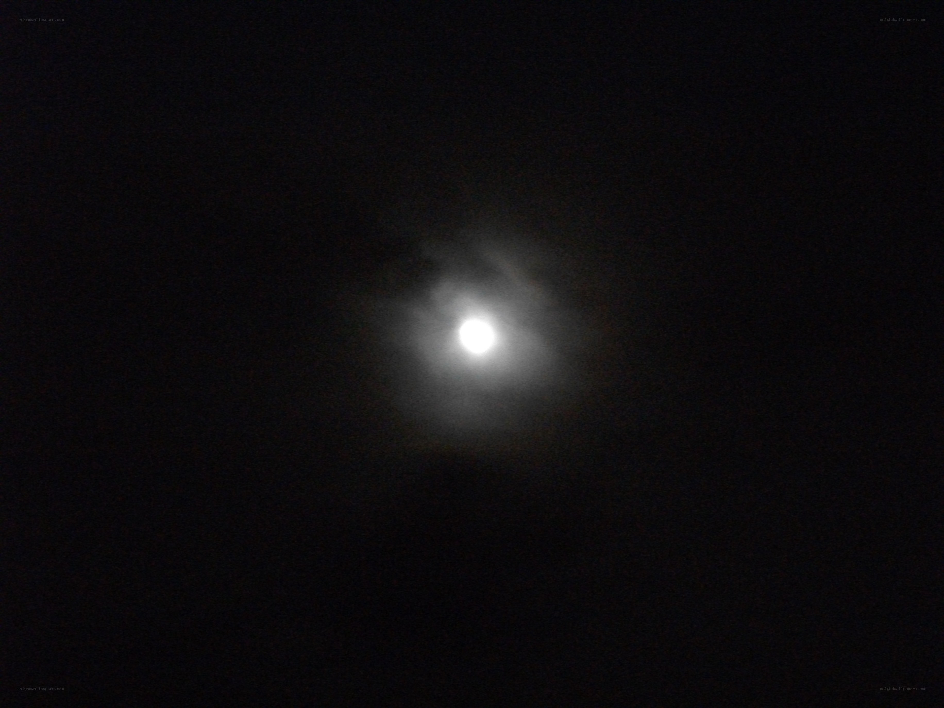 Moon through clouds