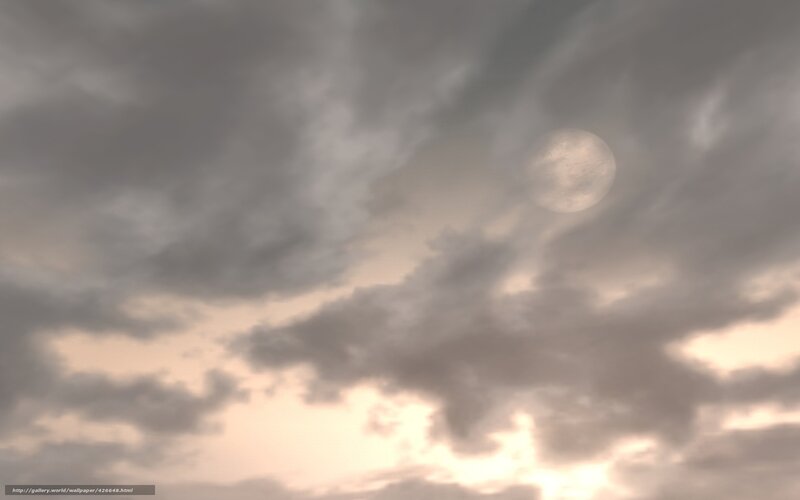 Moon through cloudy sky