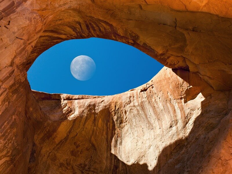 Moon Through Rock Arch — Blue