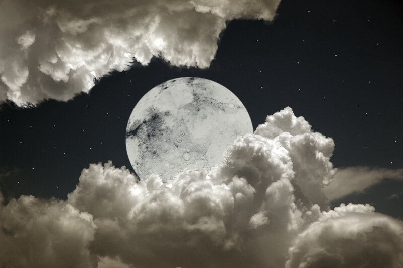 Moon through storm clouds