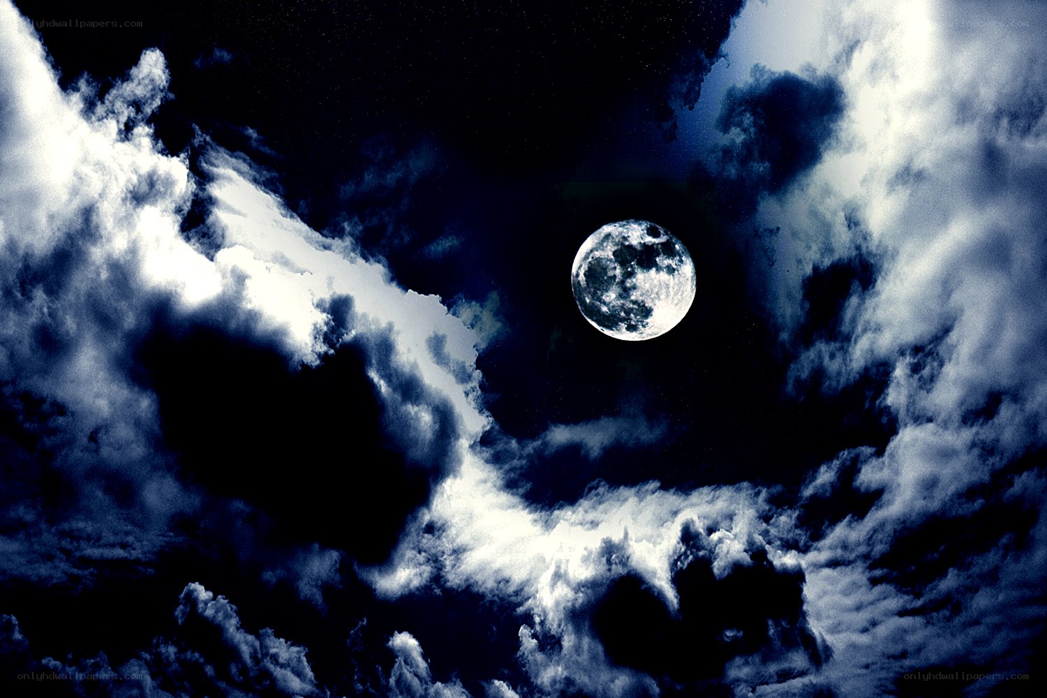 Moon through stormy clouds