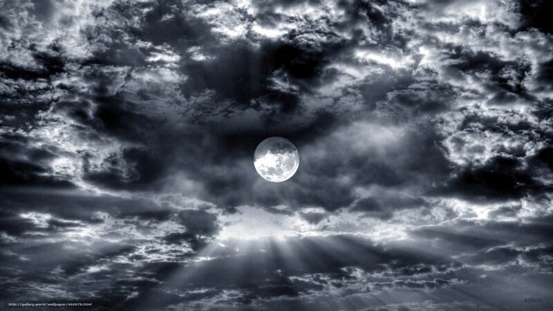 Moon through stormy clouds
