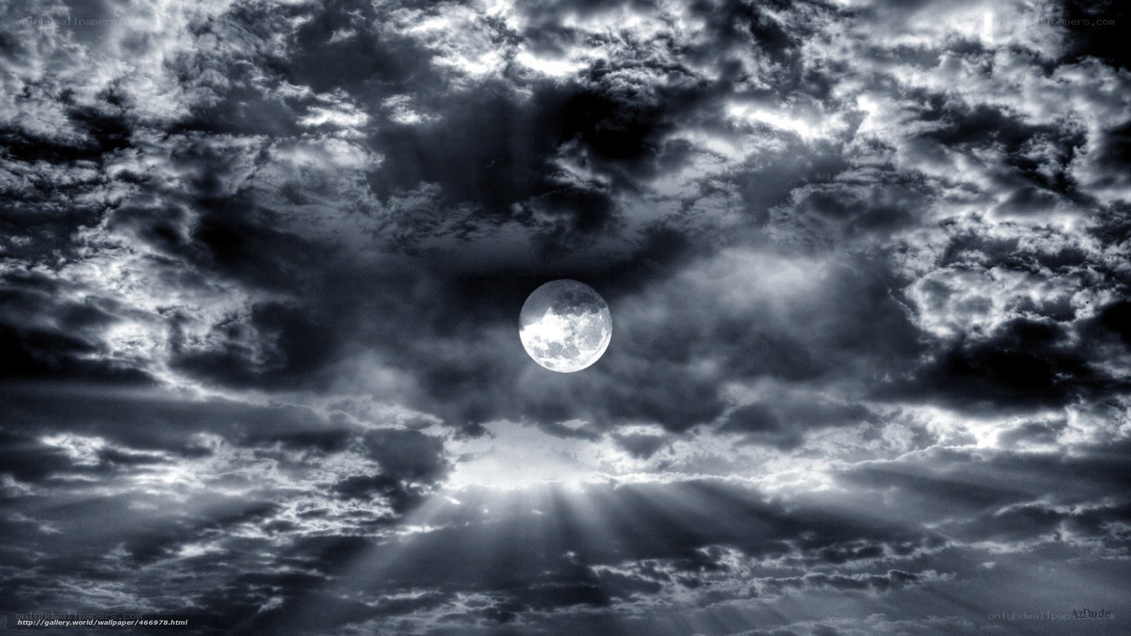 Moon through stormy clouds
