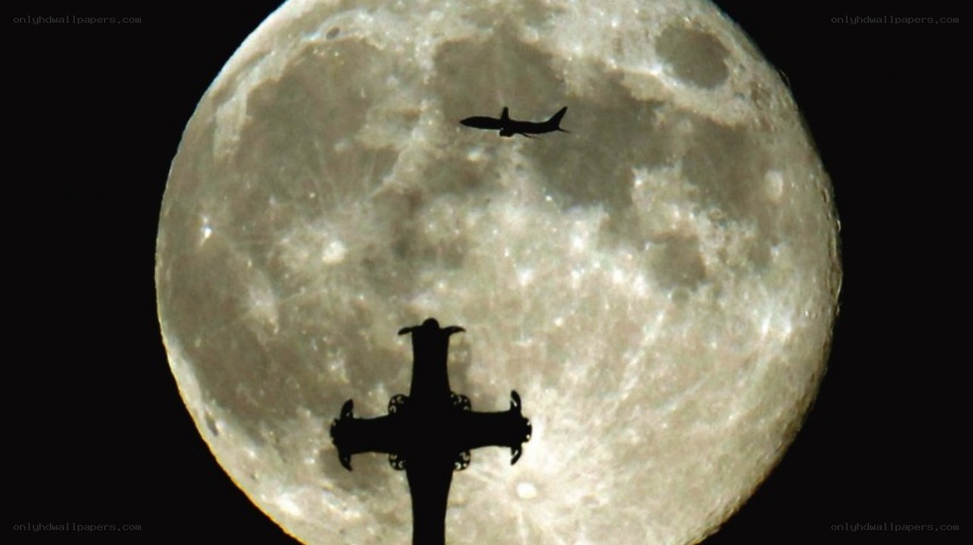 Moon with airplane and cross