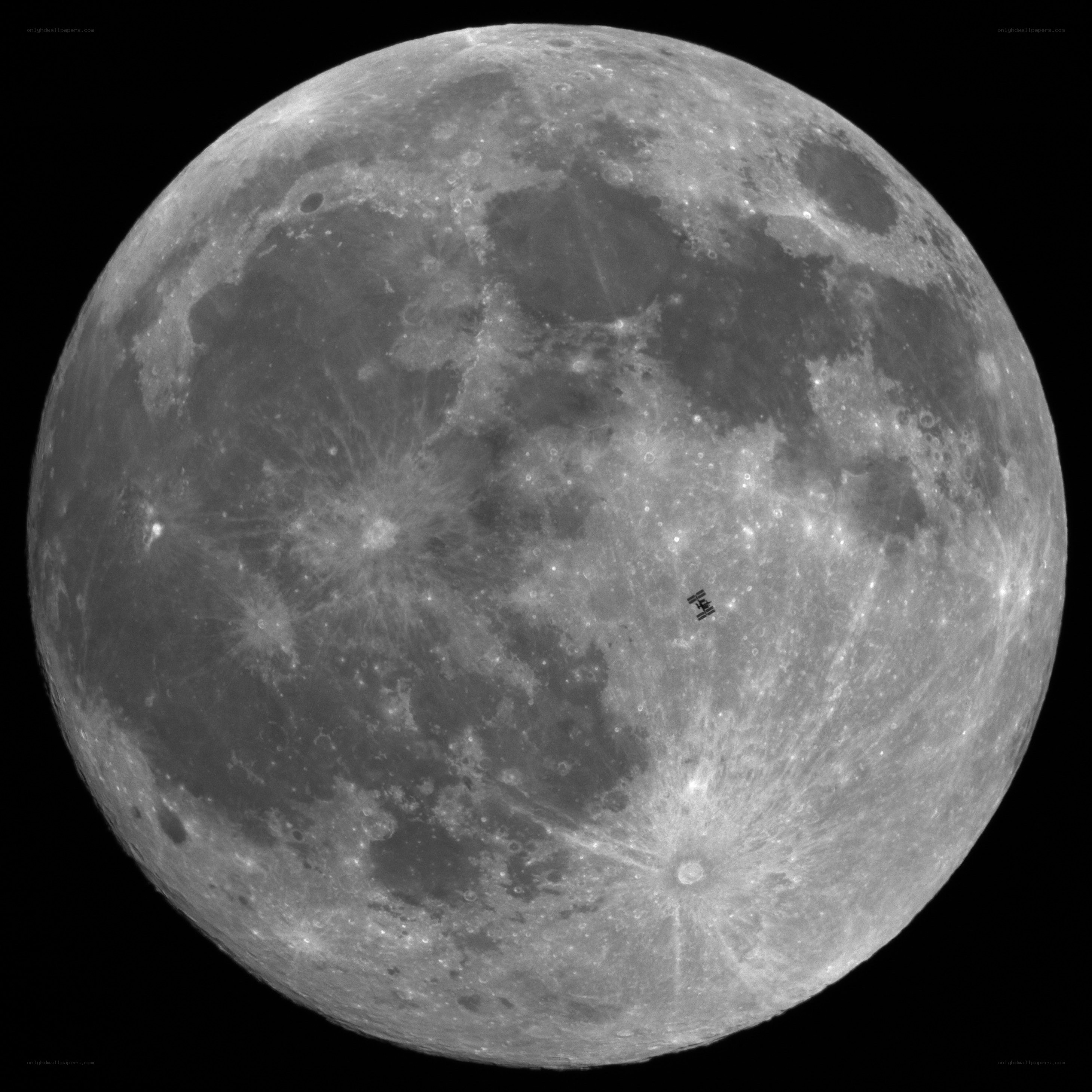 Moon with ISS in foreground
