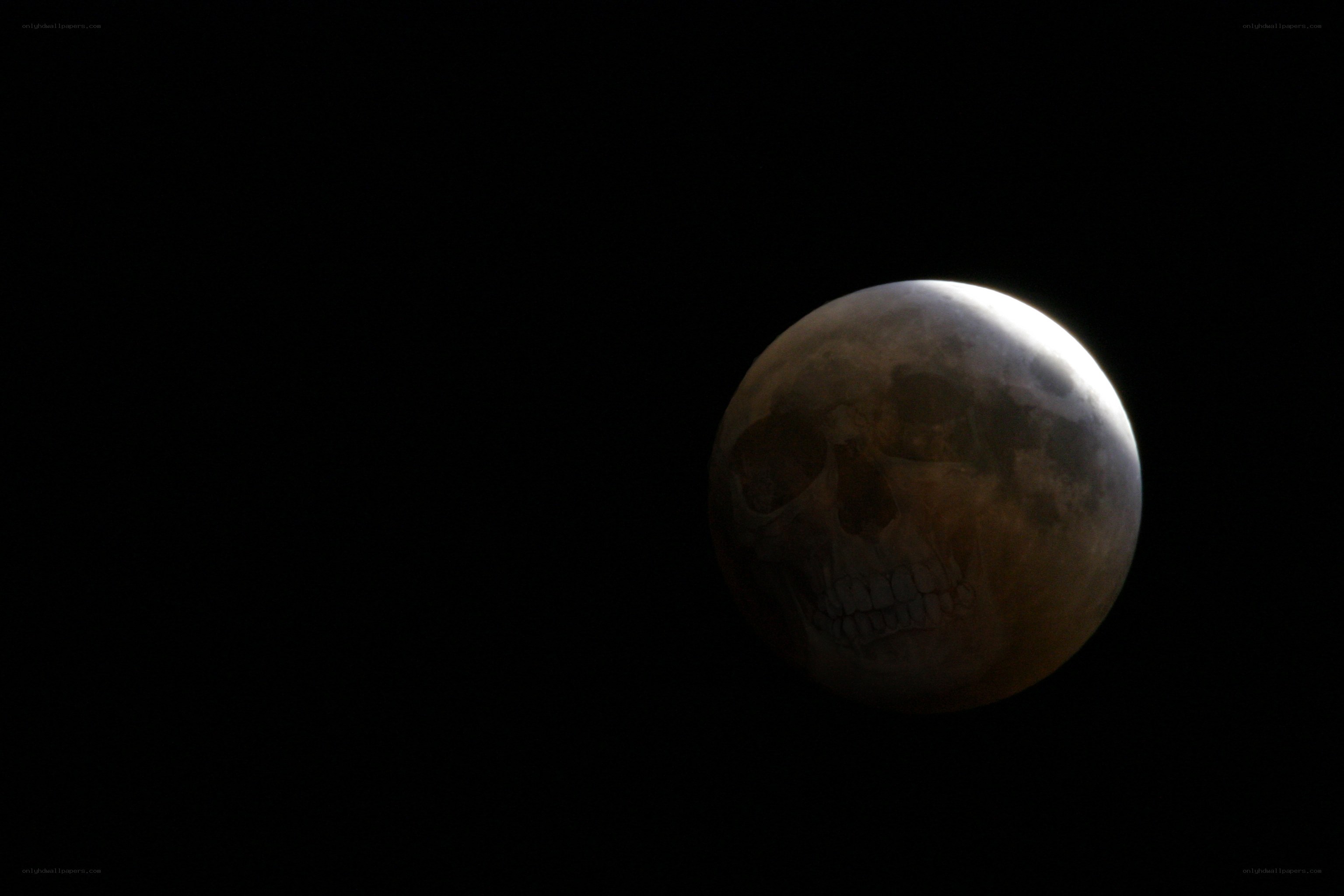 Moon with skull overlay