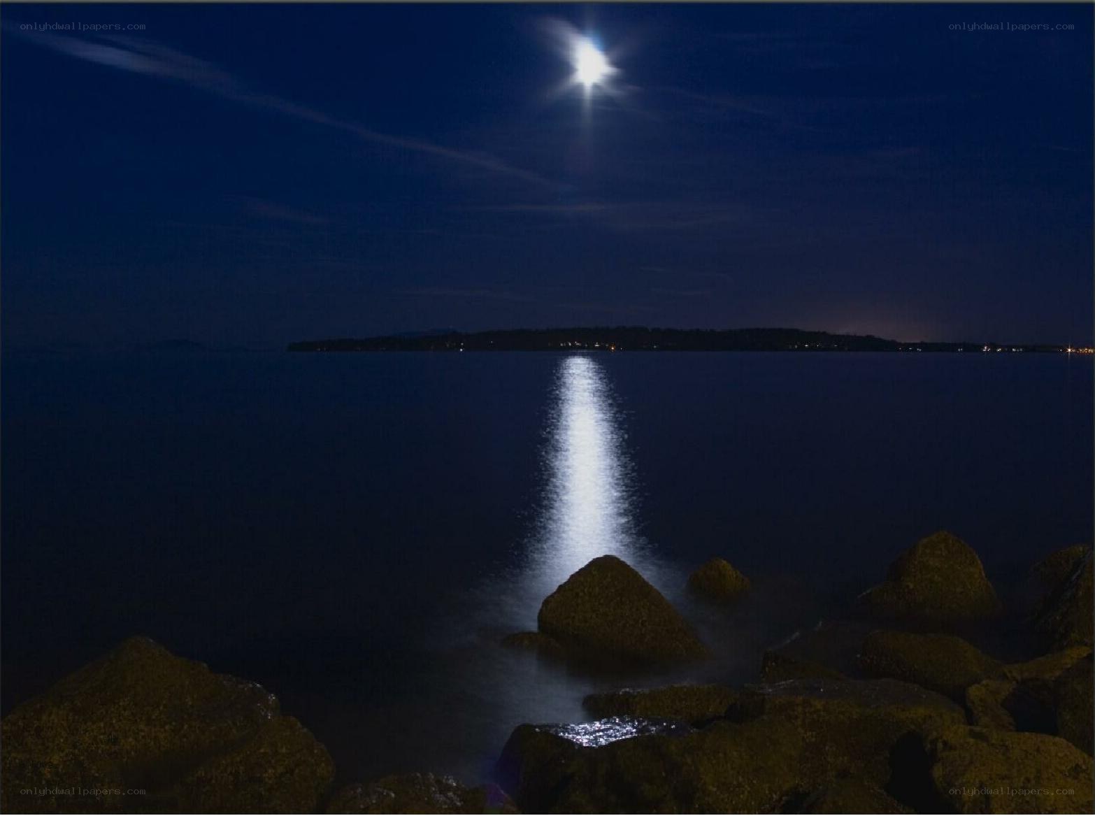 Moonlight on the water at night