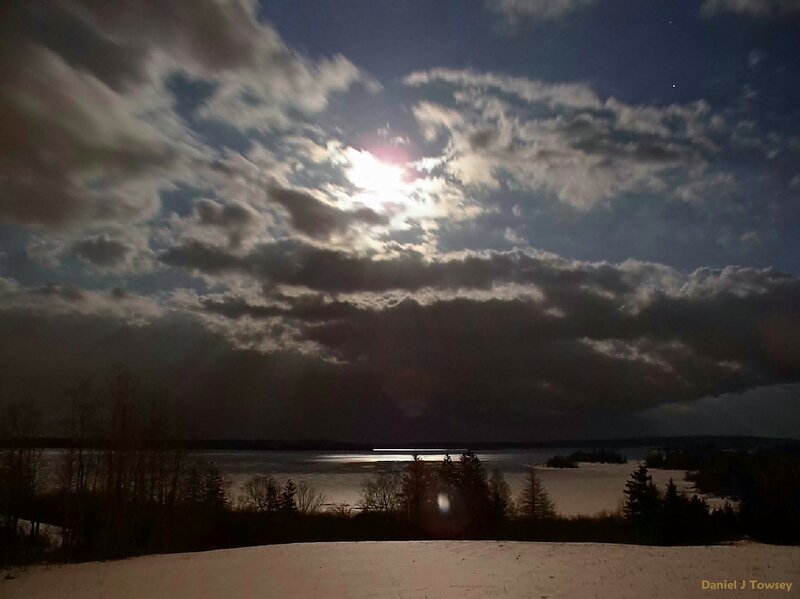 Moonlight over a frozen lake