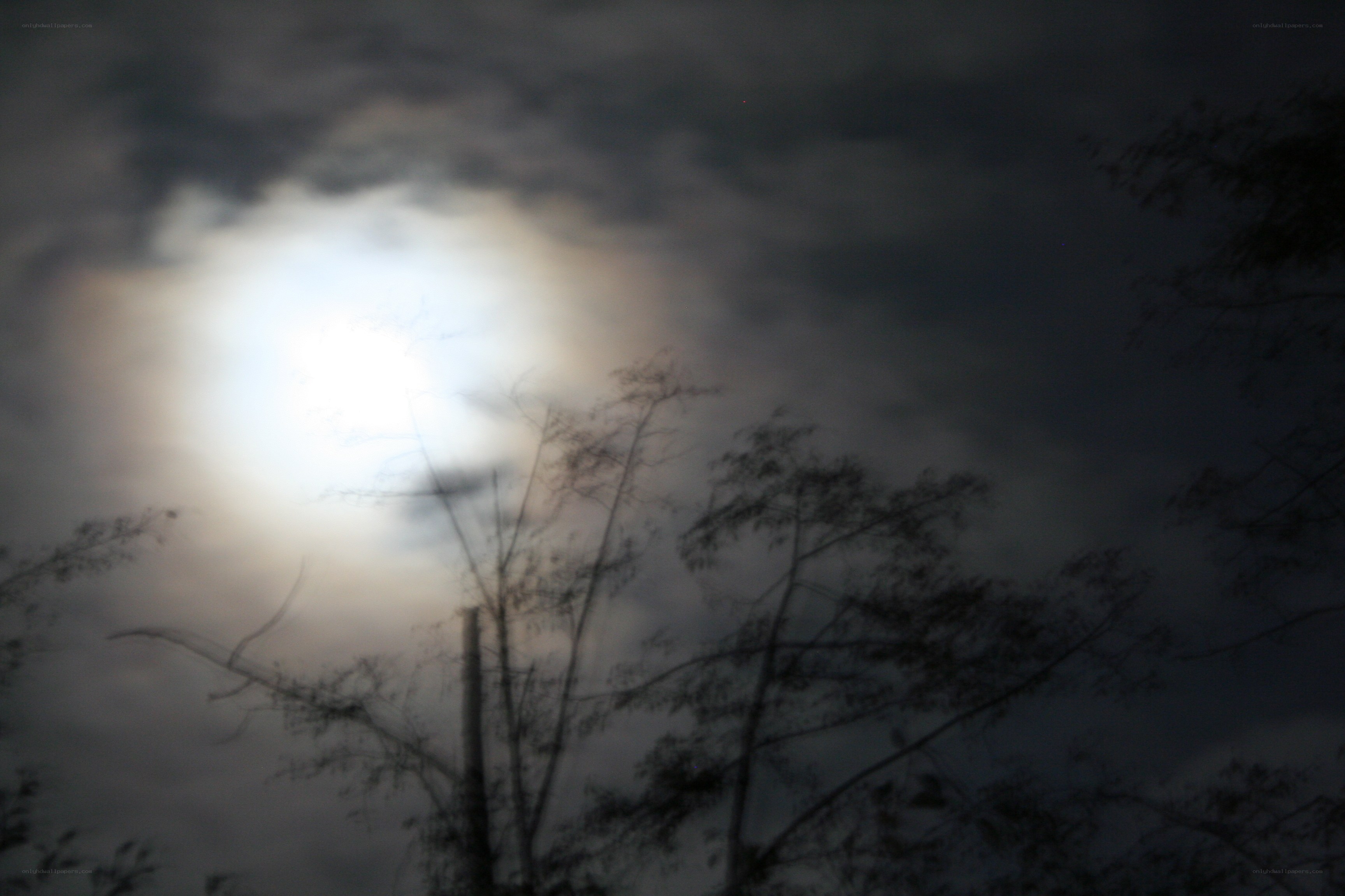 Moonlight through clouds