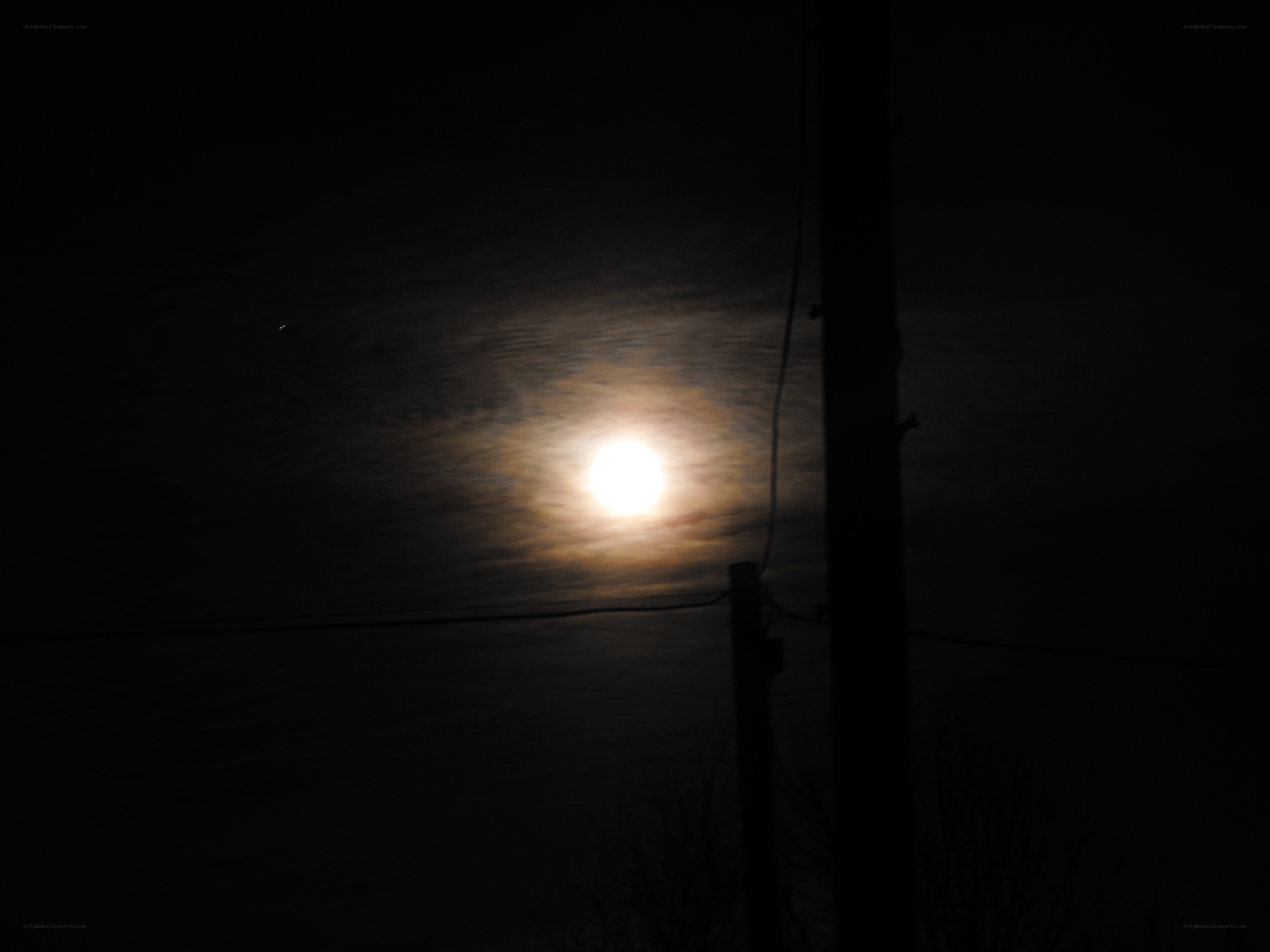 Moonlight through clouds