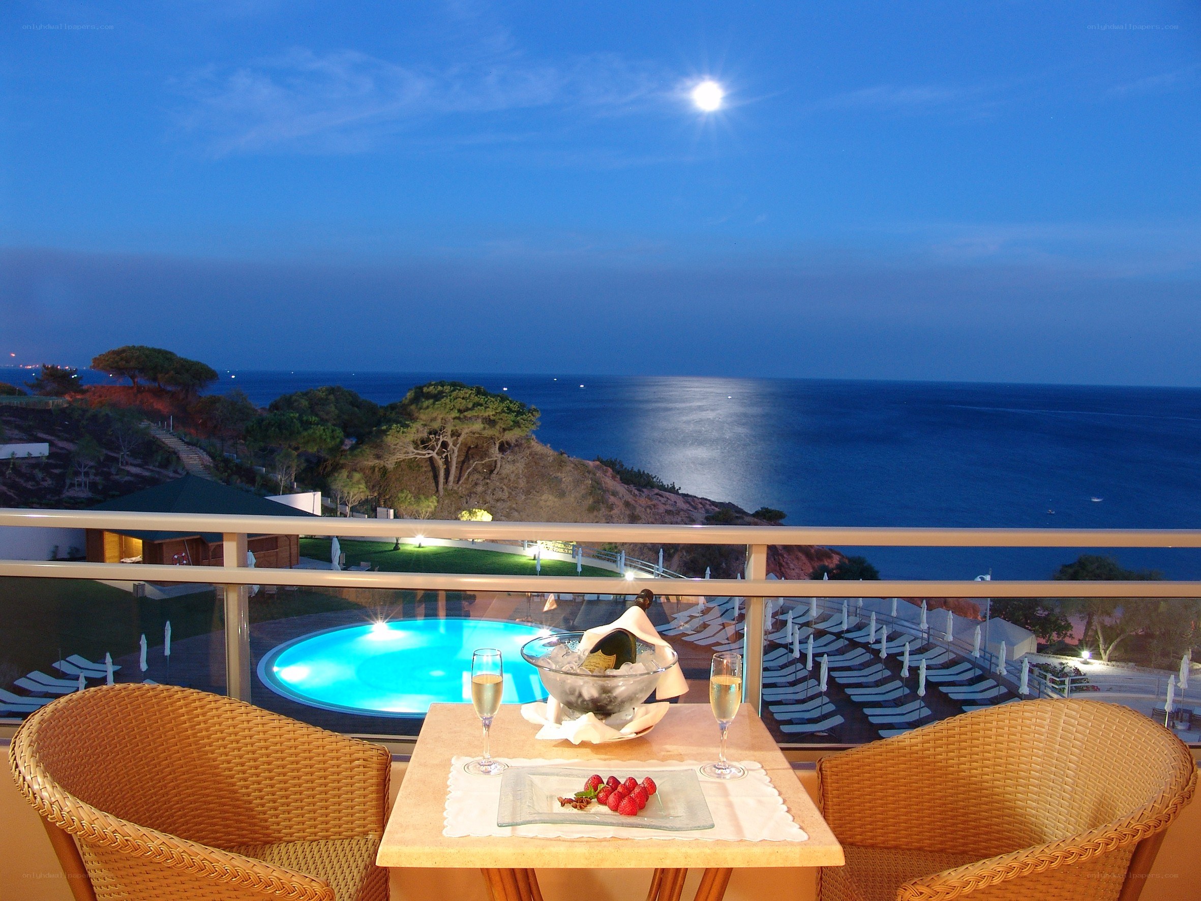 Moonlit balcony with ocean view
