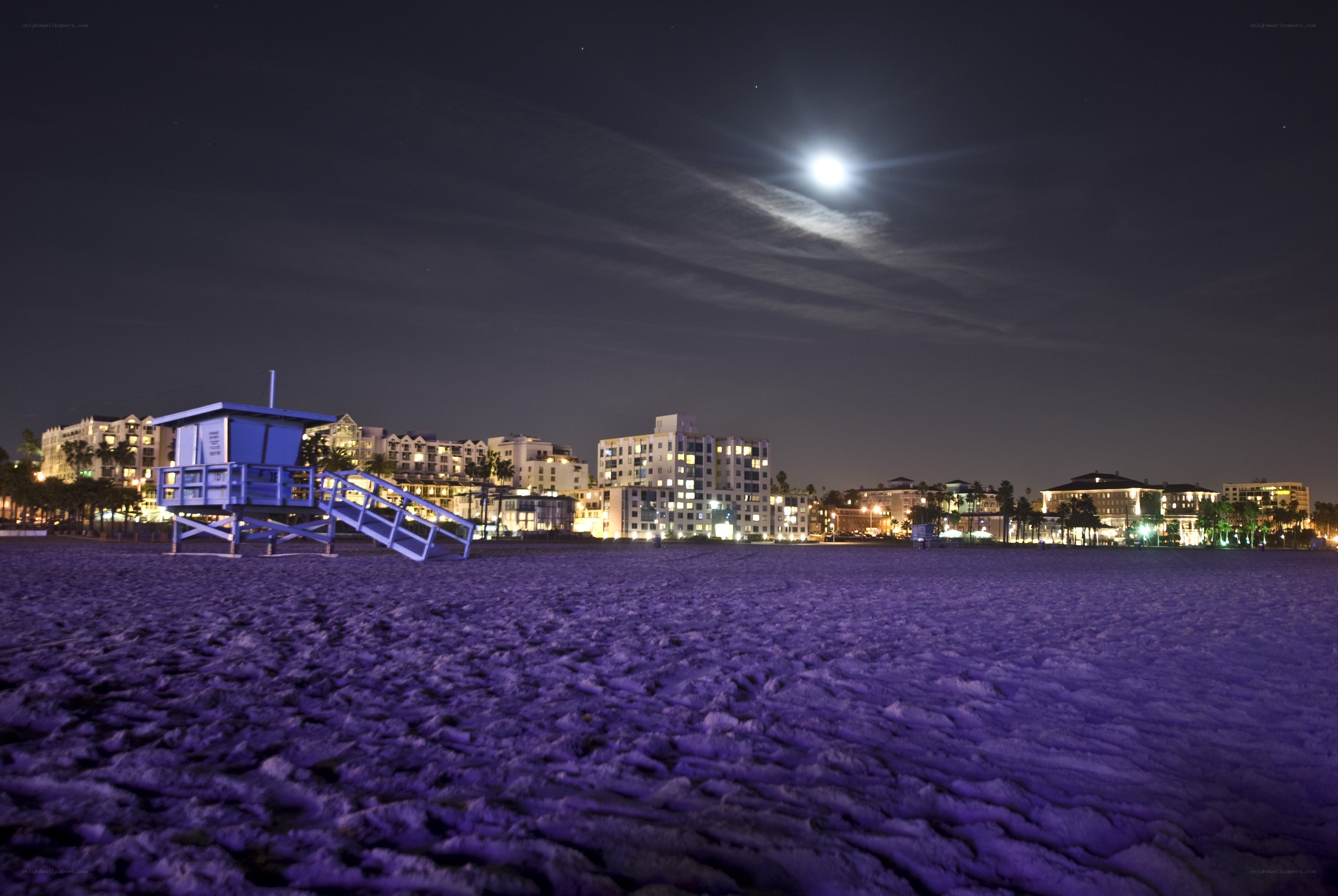 Moonlit beach at night