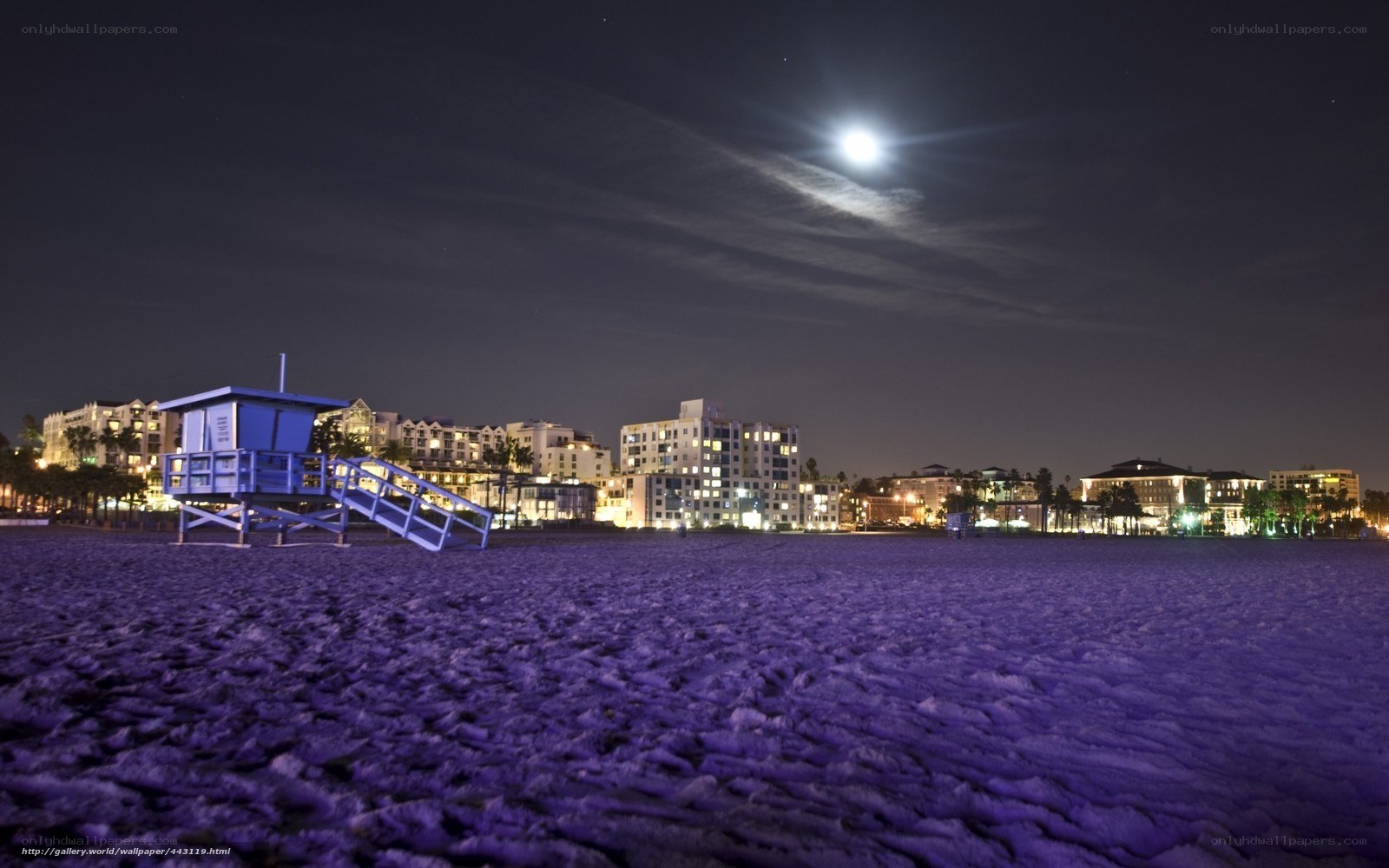 Moonlit beach at night