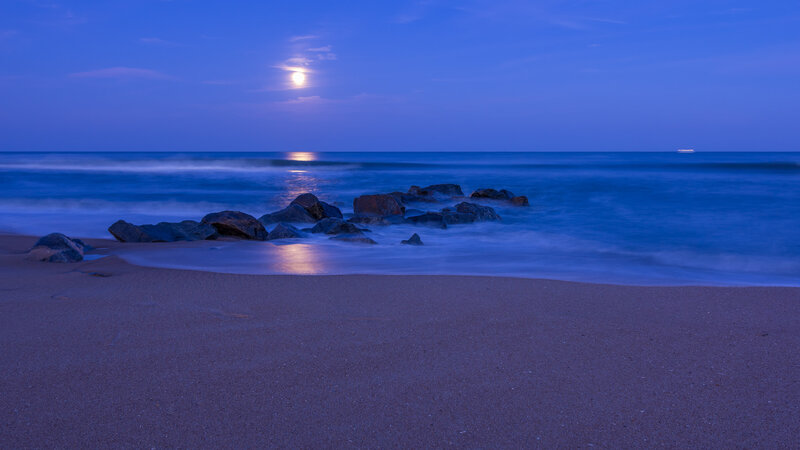 Moonlit Beach at Night — Blue, Serene, Photograph, Moon, Ocean, Rocks, Sand