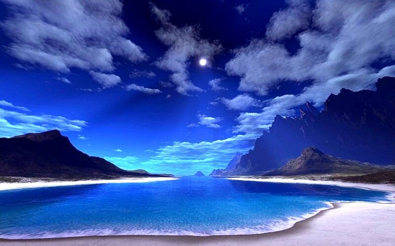 Moonlit beach with mountains