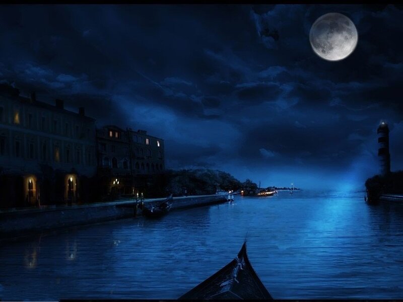 Moonlit canal at night