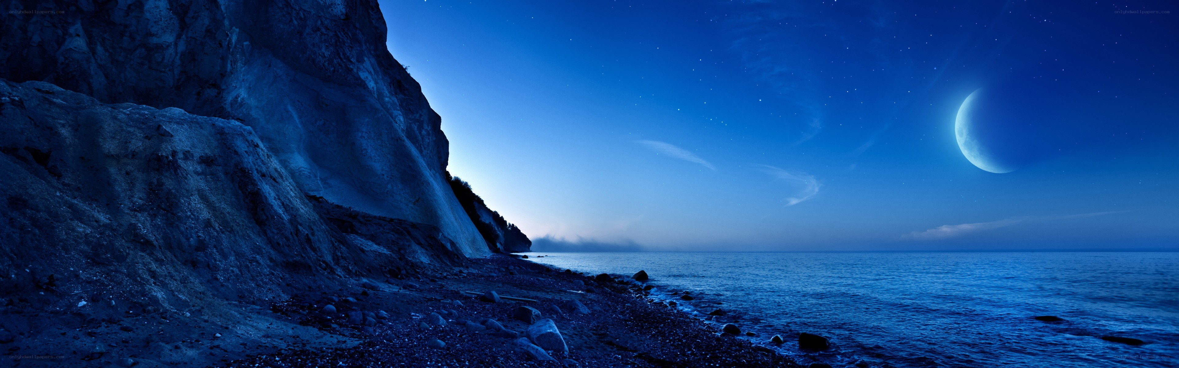 Moonlit cliff by the sea