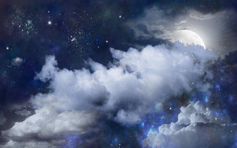 Moonlit clouds in starry sky