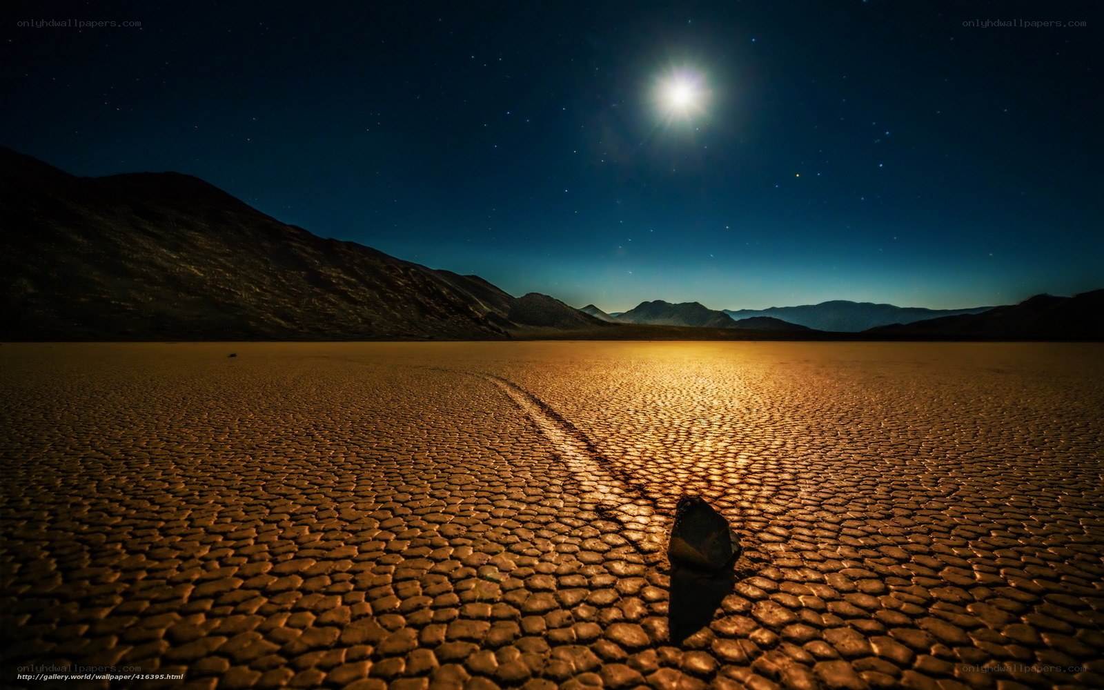Moonlit desert rock trail