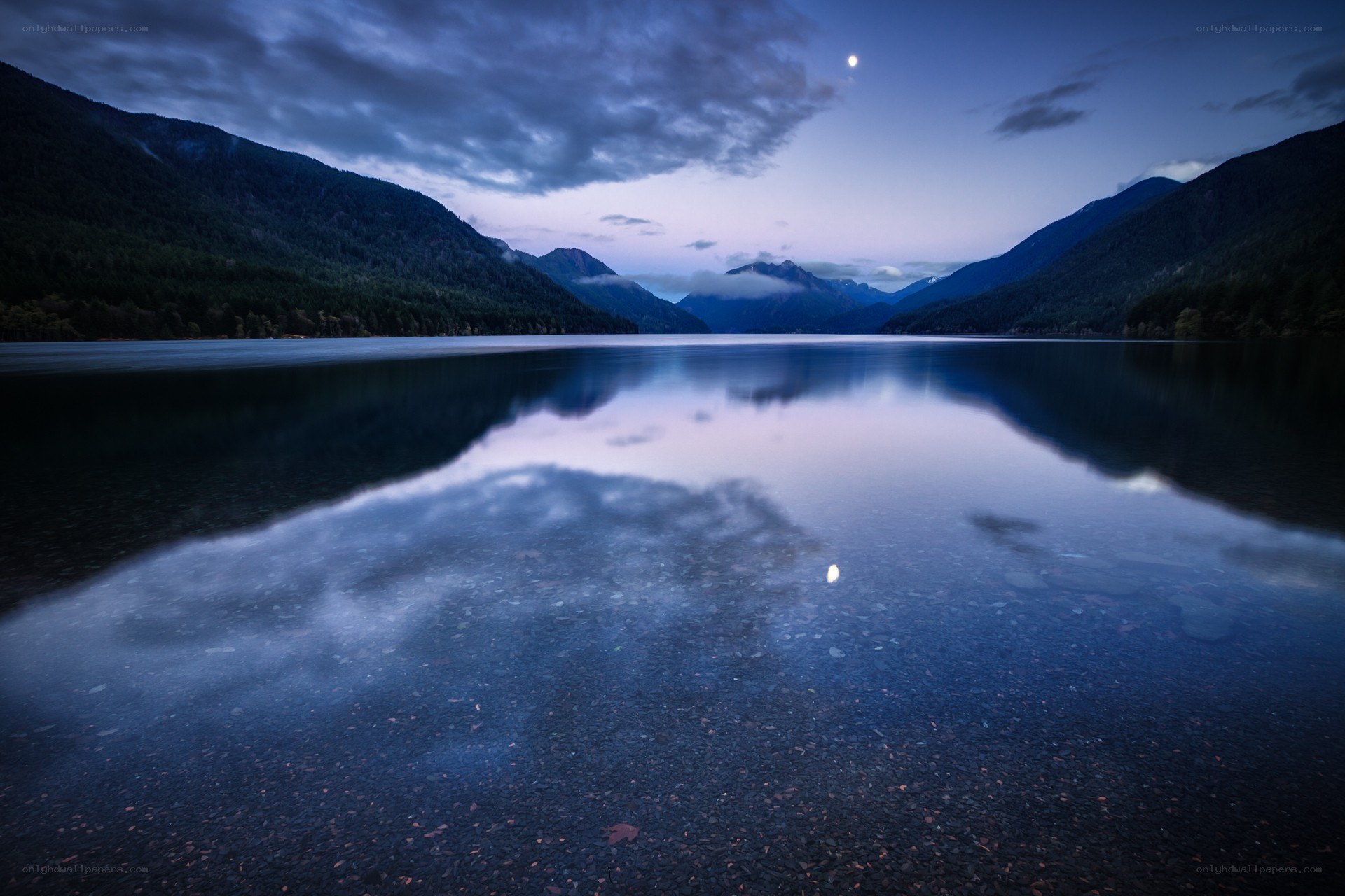 Moonlit lake at dusk