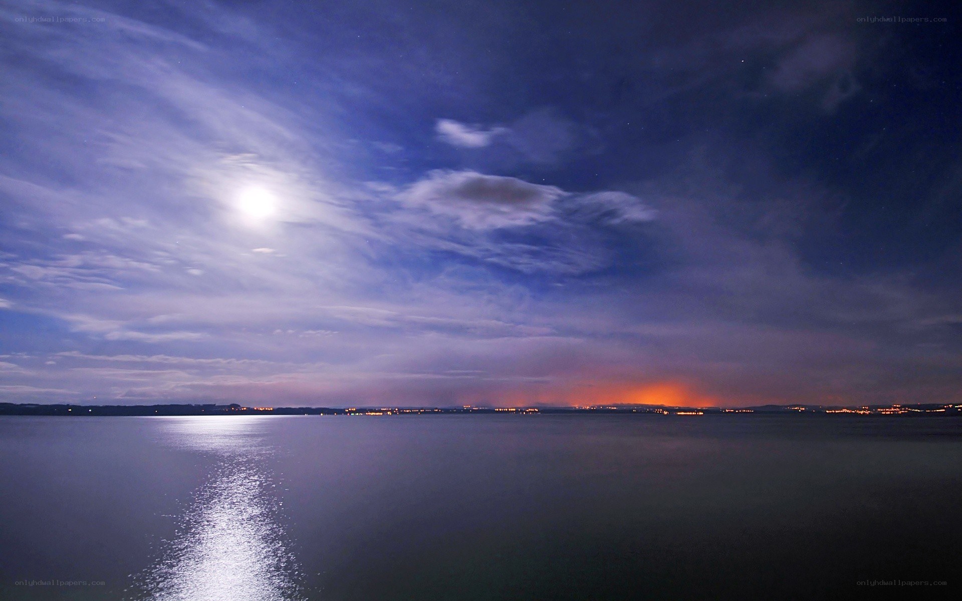 Moonlit lake at night