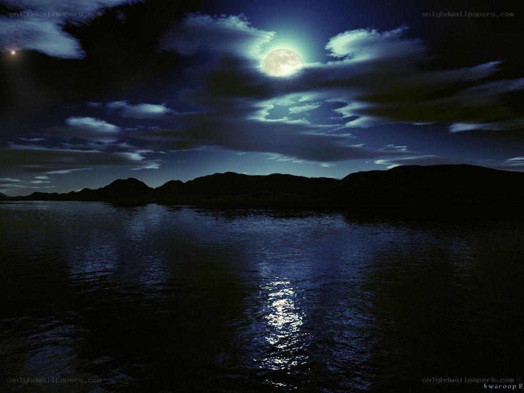 Moonlit lake at night
