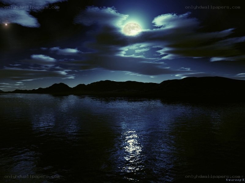 Moonlit lake at night