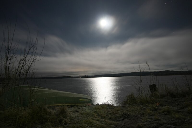 Moonlit lake at night