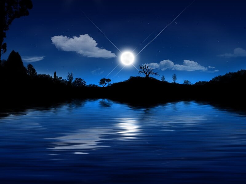 Moonlit lake at night