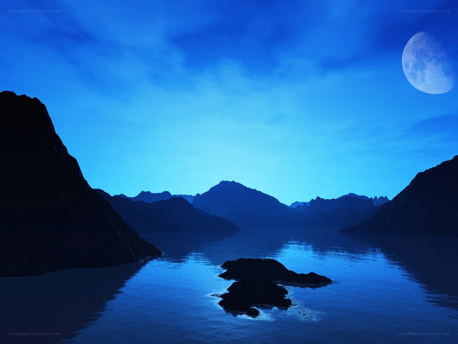 Moonlit mountain lake at night
